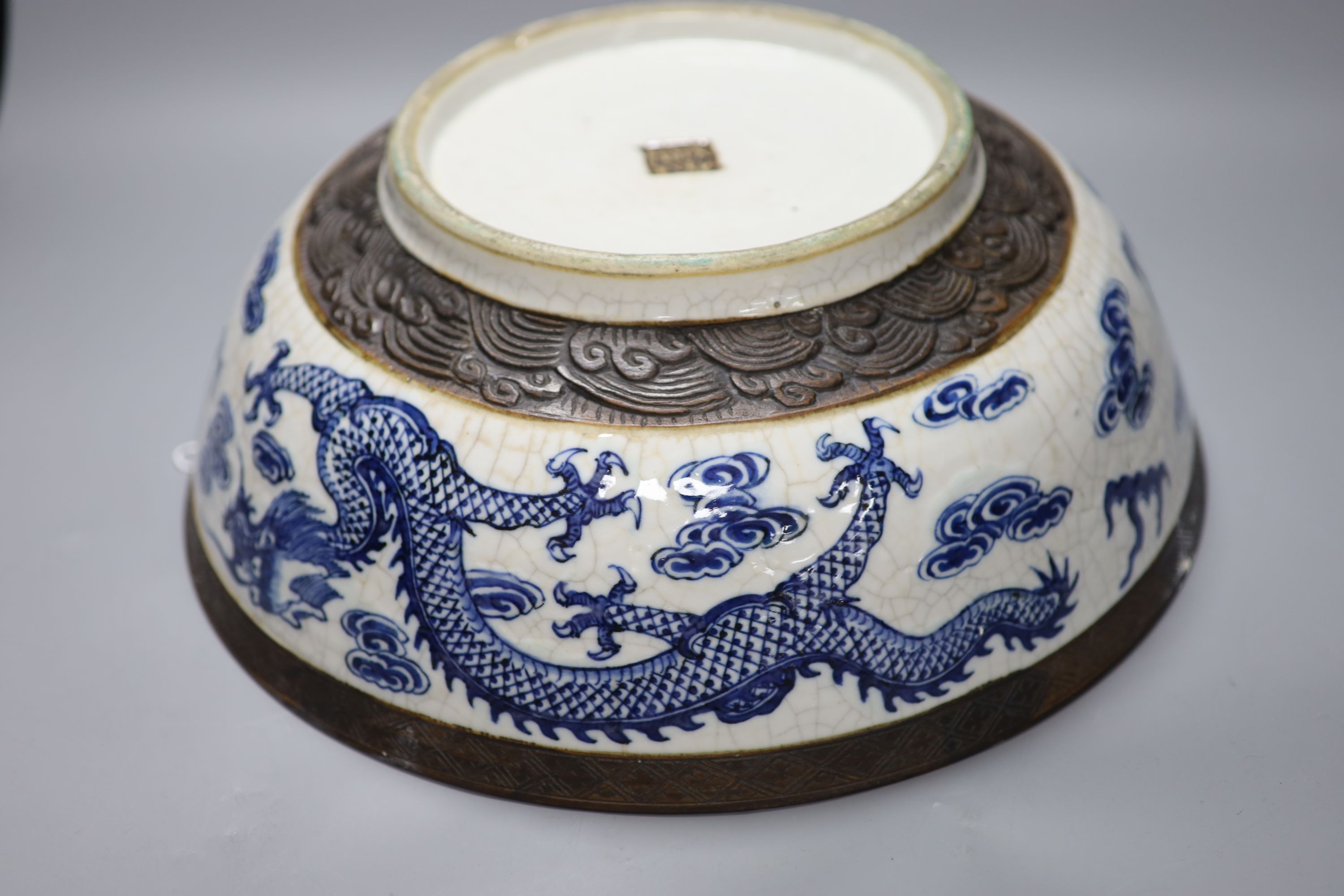 A large Chinese blue and white crackle glazed dragon bowl, 19th century, diameter 37cm